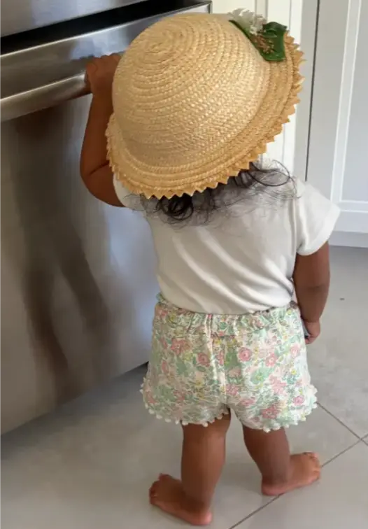 Grand daughter at fridge